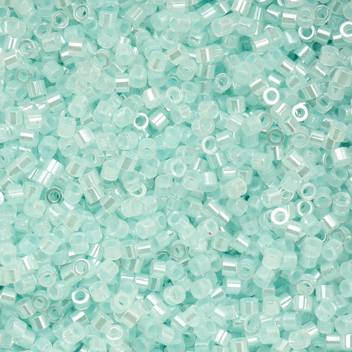 697cy11-1030 Cylin Bead sz 11 25g Bag Light Crystal Aqua Ceylon