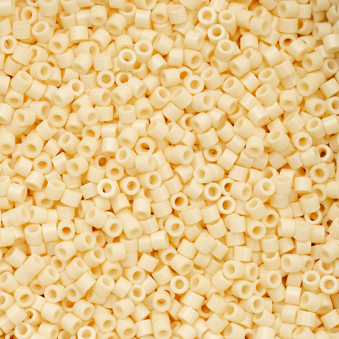 697cy11-1064 Cylin Bead sz 11 25g Bag Dark Cream