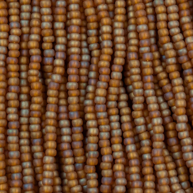 79-FTR-1105S Czech Seed Beads, sz 11 Transparent Matt Medium Topaz AB (strung)