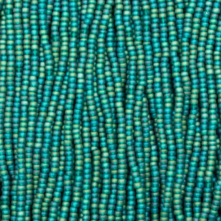 79-FTR-1121S Czech Seed Beads, sz 11 Transparent Matt Teal AB (strung) 9.webp