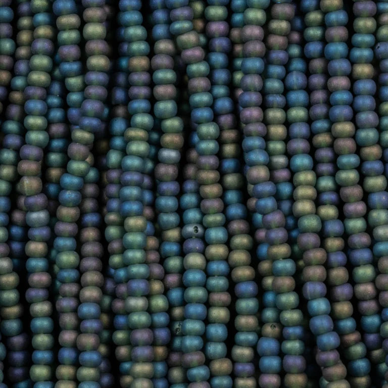 79-FTR-1124S Czech Seed Beads, sz 11 Transparent Matt Dark Green AB (strung)