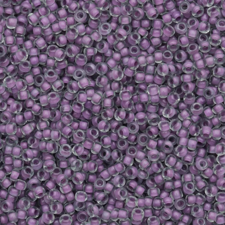 79-L-1038L Czech Seed Beads, sz 10 Colourlined Dyed Terra Purple Pale Green (loose)