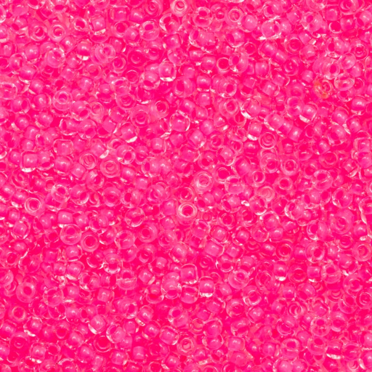 79-LN-1003L Czech Seed Beads, sz 10 Transparent Crystal Neon Pink Lined (loose)