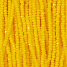 79O11132S Czech Seed Beads, 11 Charlotte – Opaque Yellow (strung)