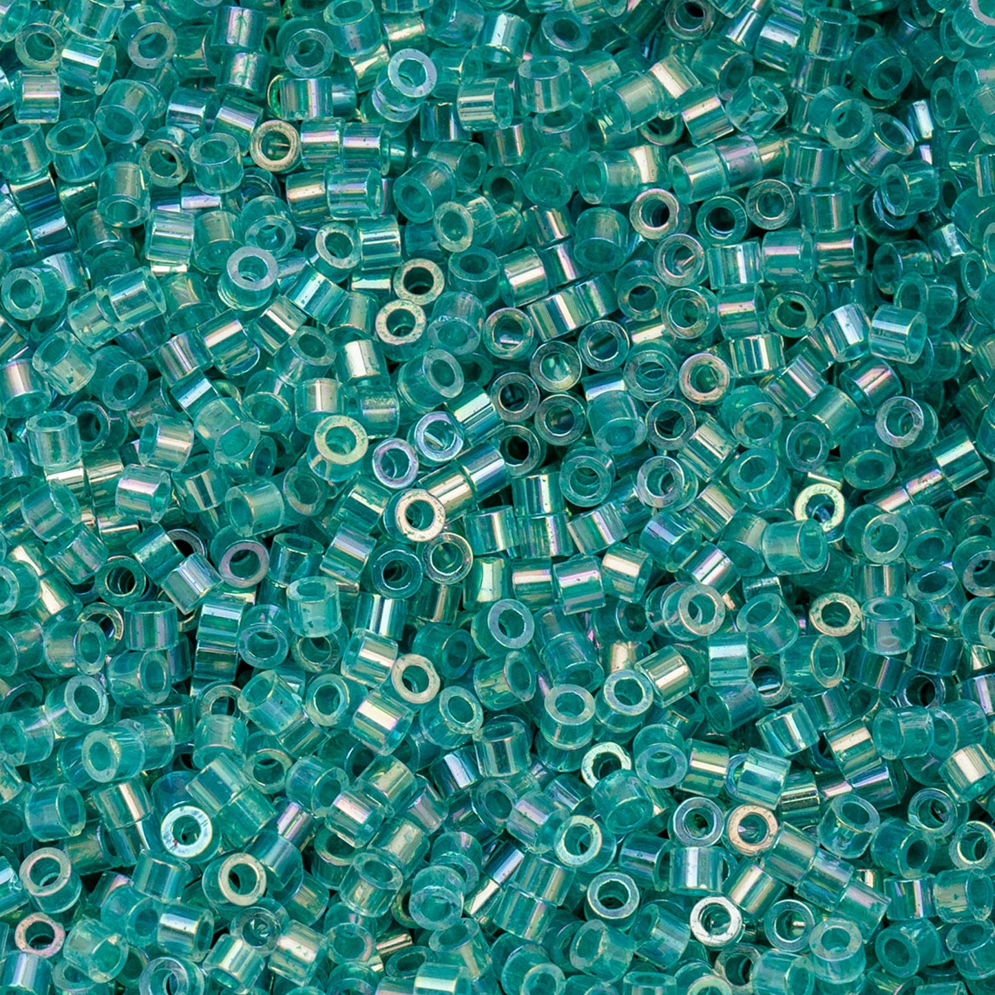697cy11-1082 Cylin Bead 11 25g Bag Transparent Teal Caribbean AB