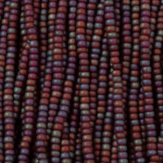 79-FTR-1138S Czech Seed Beads, sz 11 Transparent Matt Garnet AB (strung)