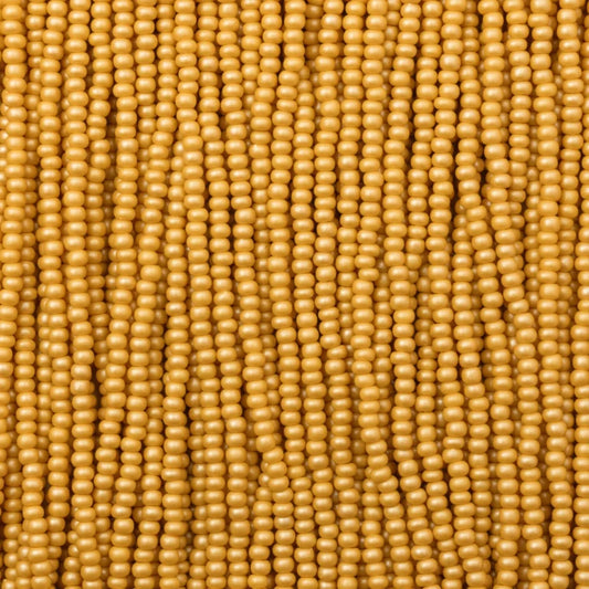 79-PL-1103S Czech Seed Beads, sz 11 PermaLux Dyed Chalk Yellow-Brown (strung)