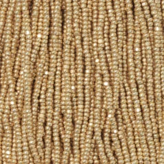 79M11338S Czech Seed Beads, 13 Charlotte – Metallic Light Gold (strung)
