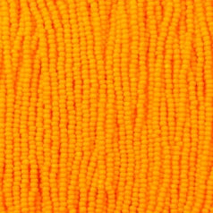 79O11133S Czech Seed Beads, 11 Charlotte – Opaque Light Orange (strung)